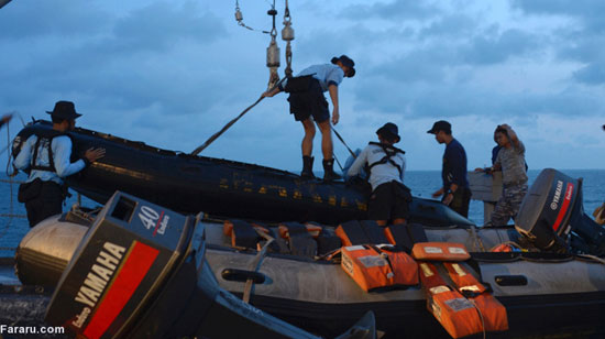 عکس: درآوردن دم هواپیمای ایرآسیا از آب