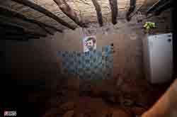 استاندار کرمان: دیواری که عکس احمدی نژاد داشت ویران نشد