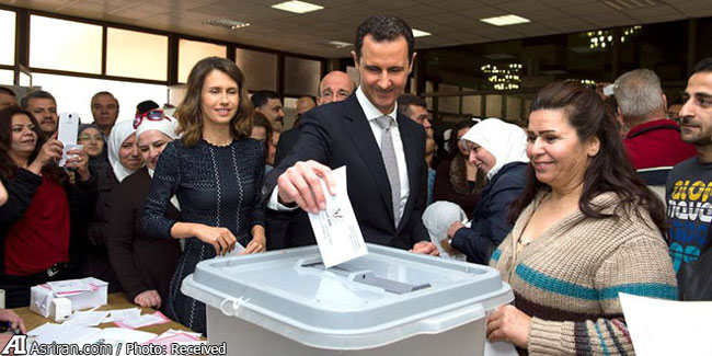 عکس: اسد و همسرش پای صندوق رای