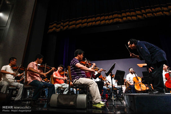 عکس: تمرین مشترک ارکستر فیلارمونیک چین و ارکستر سمفونیک تهران