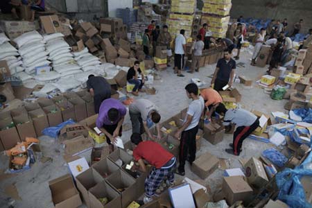 توزیع کمک های غذایی ایران در غزه,کمک ایران به غزه,تصاویرکمک غذایی ایران به غزه